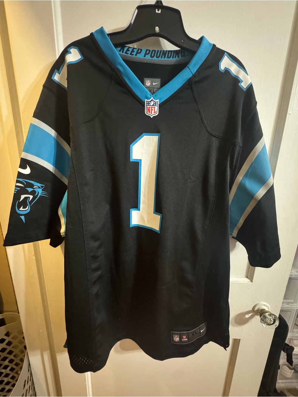 Nike Men’s Black Carolina Panthers Cam Newton Football Jersey with Blue Accents